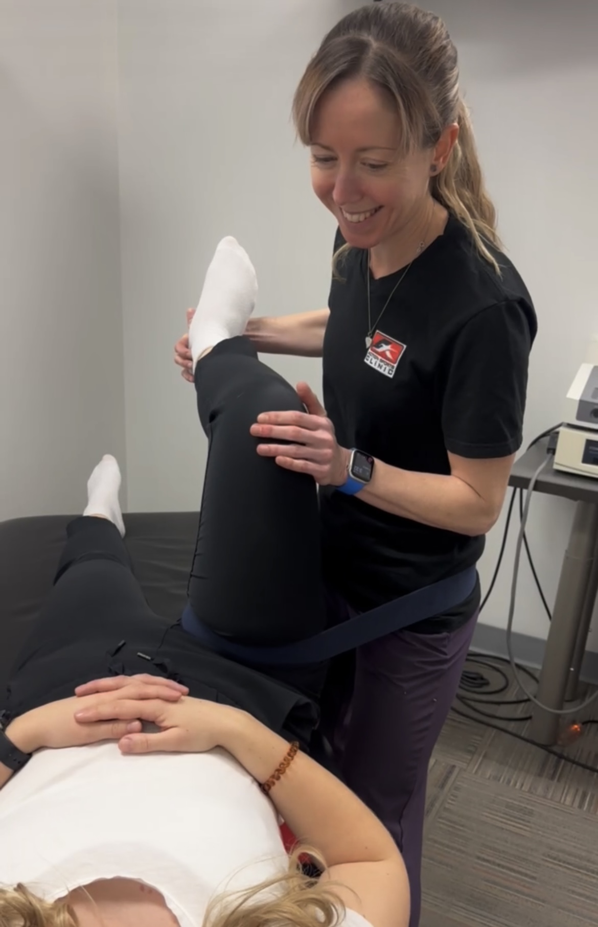 Action Sports Clinic therapist treating a patient